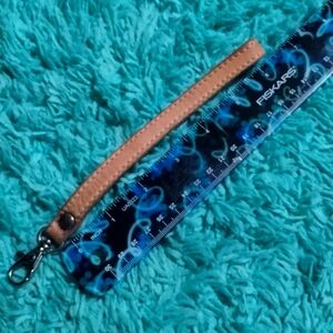 Consuela leather wrist strap